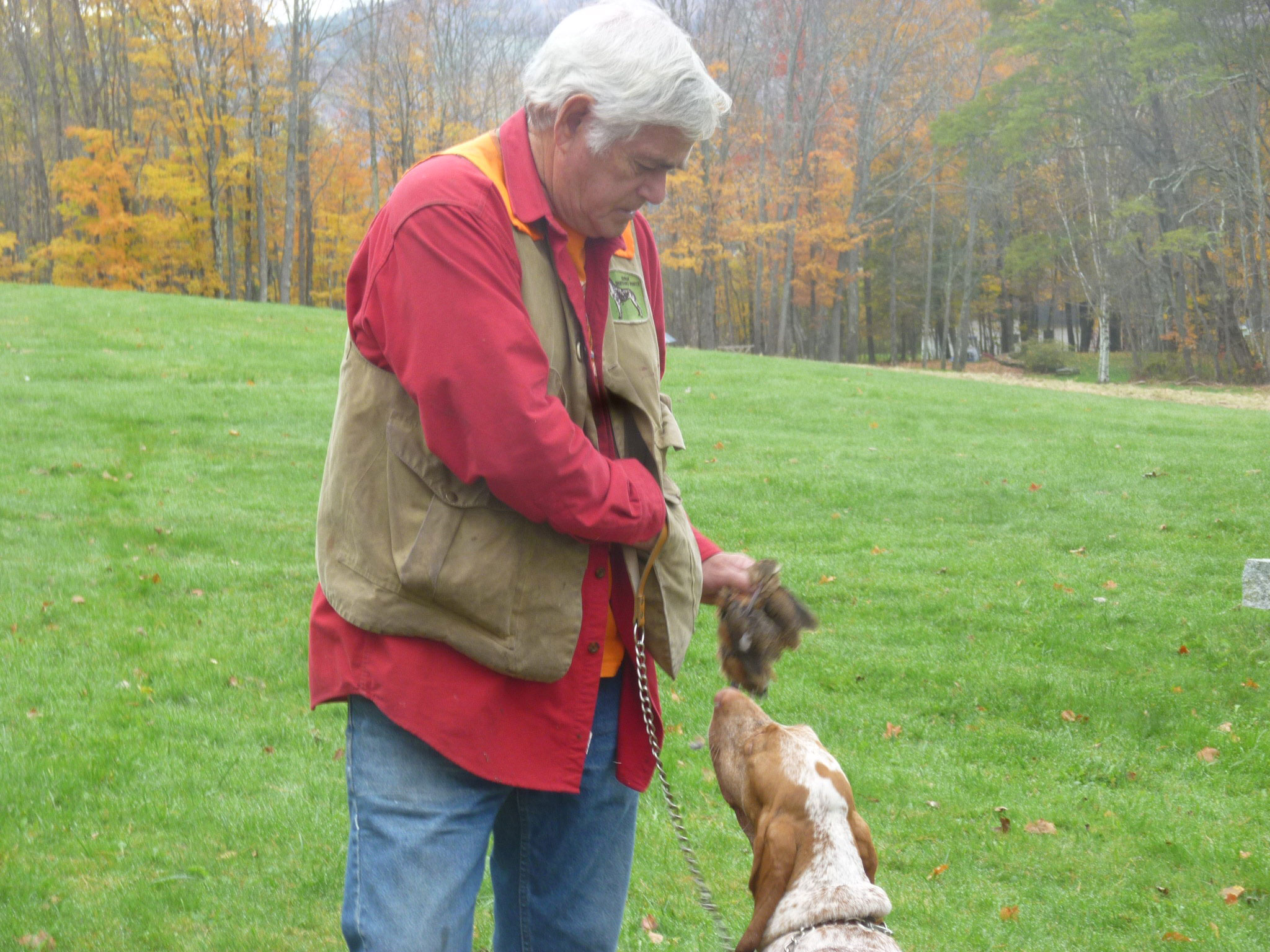 "Abbie waiting for her grandfather to pull her other bird from his game pouch."